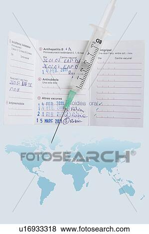 Stock Photo - Travel vaccination certificate, world map and syringe. Fotosearch