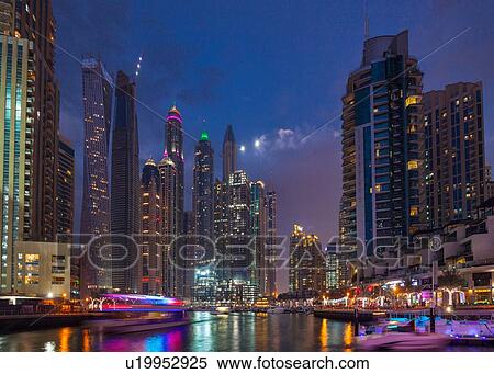 Vibrant nightlife and boats, Dubai Marina, UAE View Large Photo Image Stock Photography - Vibrant nightlife and boats, Dubai Marina, UAE. Fotosearch