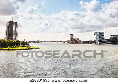 View of river and skyscrapers, Rotterdam, South Holland, Netherlands View Large Photo Image Stock Photography - View of river and skyscrapers, Rotterdam, South Holland, Netherlands. Fotosearch