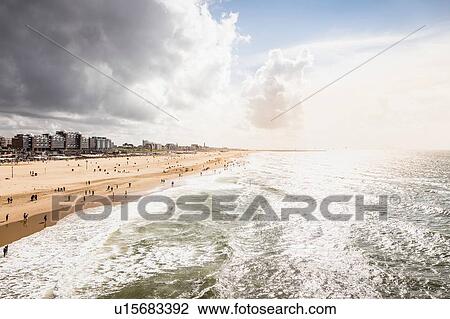 View of Scheveningen coast and beach from pier, South Holland, Netherlands View Large Photo Image Stock Image - View of Scheveningen coast and beach from pier, South Holland, Netherlands. Fotosearch