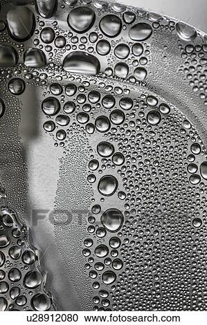 Water drops on bottle View Large Photo Image Stock Image - Water drops on bottle. Fotosearch