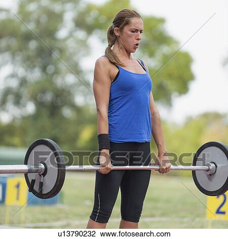 Stock Image - Weightlifting competition. Fotosearch