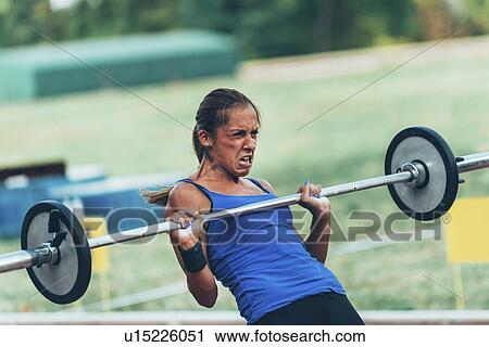 Stock Image - Weightlifting competition. Fotosearch