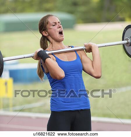 Stock Image - Weightlifting competition. Fotosearch