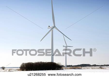 Stock Photography - Wind turbines in winter landscape. Fotosearch