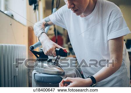 Stock Photo - Woman ironing. Fotosearch