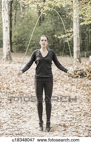 Stock Photo - Woman skipping. Fotosearch
