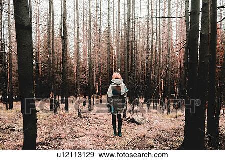 Woman standing in forest in winter, Ural, Sverdlovsk, Russia View Large Photo Image Stock Photo - Woman standing in forest in winter, Ural, Sverdlovsk, Russia. Fotosearch