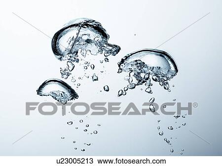 Stock Image - Air bubbles in liquid. Fotosearch