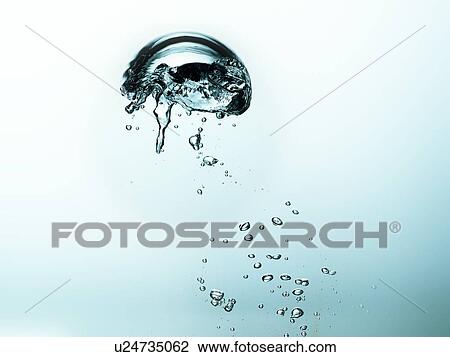 Stock Image - Air bubbles in liquid. Fotosearch
