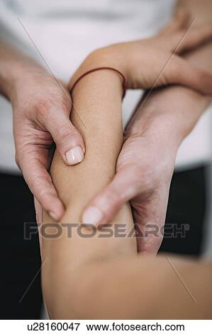 Stock Photo - Arm massage. Fotosearch