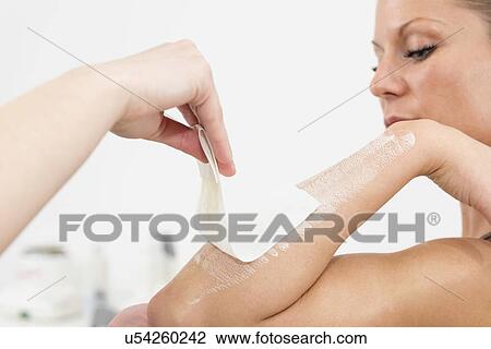 Arm waxing View Large Photo Image Stock Image - Arm waxing. Fotosearch