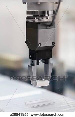 Stock Photography - Articulated robotic arm. Fotosearch
