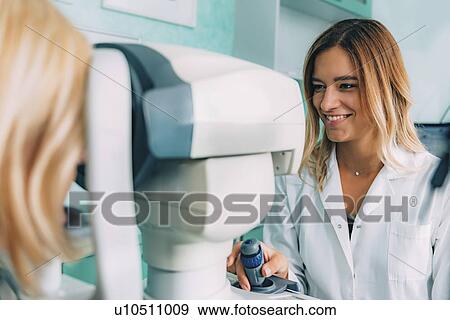 Auto refractometer eye examination View Large Photo Image Stock Photo - Auto refractometer eye examination. Fotosearch