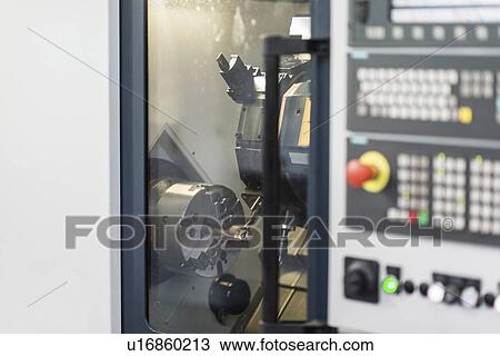 Stock Image - Automated CNC toolroom lathe. Fotosearch
