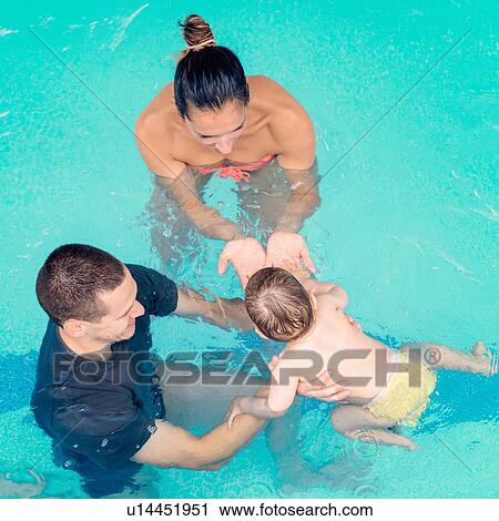 Baby swimming lesson View Large Photo Image Stock Image - Baby swimming lesson. Fotosearch
