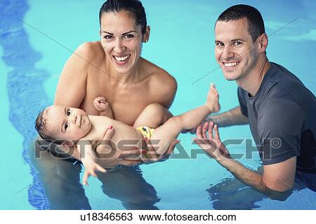 Baby swimming lesson View Large Photo Image Stock Image - Baby swimming lesson. Fotosearch