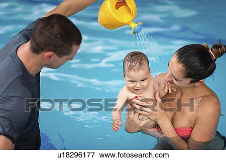 Baby swimming lesson View Large Photo Image Stock Photo - Baby swimming lesson. Fotosearch