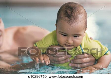 Baby swimming View Large Photo Image Stock Image - Baby swimming. Fotosearch