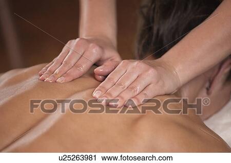 Stock Image - Back massage. Fotosearch