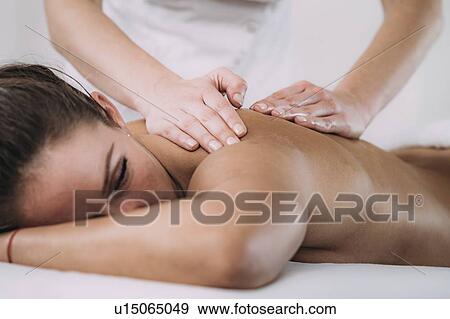 Stock Photo - Back massage. Fotosearch