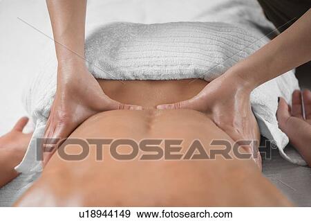 Stock Photo - Back massage. Fotosearch