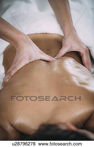 Stock Photo - Back massage. Fotosearch