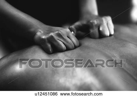Back massage View Large Photo Image Stock Photograph - Back massage. Fotosearch