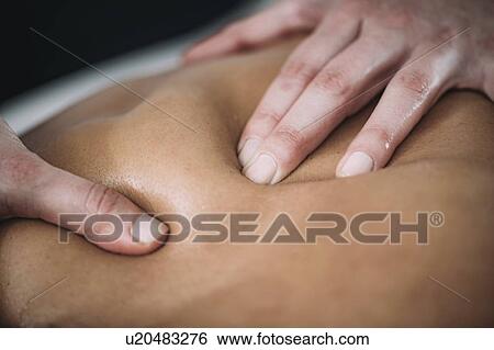 Back massage View Large Photo Image Stock Photograph - Back massage. Fotosearch