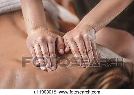 Back massage View Large Photo Image Stock Photography - Back massage. Fotosearch