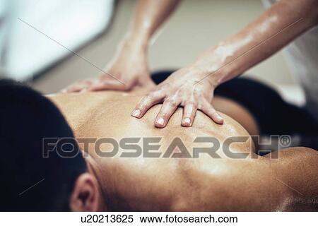 Back massage View Large Photo Image Stock Photography - Back massage. Fotosearch