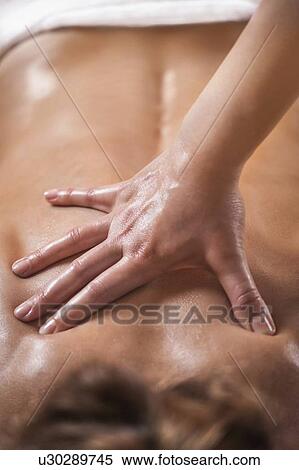 Stock Photography - Back massage. Fotosearch