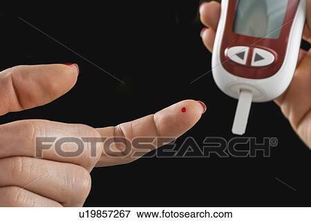 Blood sugar test View Large Photo Image Stock Photo - Blood sugar test. Fotosearch