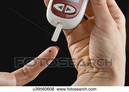 Blood sugar test View Large Photo Image Stock Photo - Blood sugar test. Fotosearch