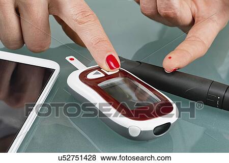 Blood sugar test View Large Photo Image Stock Photo - Blood sugar test. Fotosearch