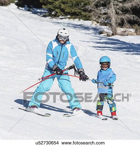Boy having skiing lesson View Large Photo Image Picture - Boy having skiing lesson. Fotosearch