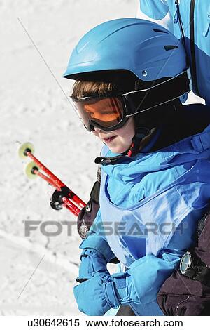 Stock Photography - Boy having skiing lesson. Fotosearch