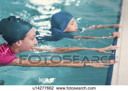 Boy in swimming class View Large Photo Image Stock Image - Boy in swimming class. Fotosearch