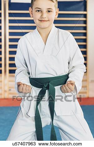 Boy in taekwondo class View Large Photo Image Stock Image - Boy in taekwondo class. Fotosearch