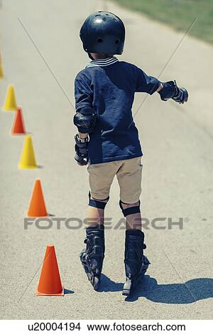 Boy learning to roller skate View Large Photo Image Picture - Boy learning to roller skate. Fotosearch