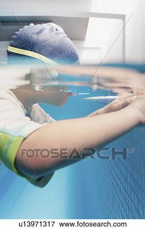 Boy learning to swim View Large Photo Image Stock Photo - Boy learning to swim. Fotosearch