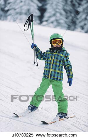 Stock Photography - Boy skiing. Fotosearch