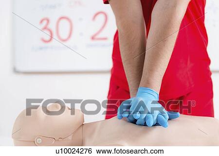 Cardiopulmonary resuscitation training View Large Photo Image Stock Photograph - Cardiopulmonary resuscitation training. Fotosearch
