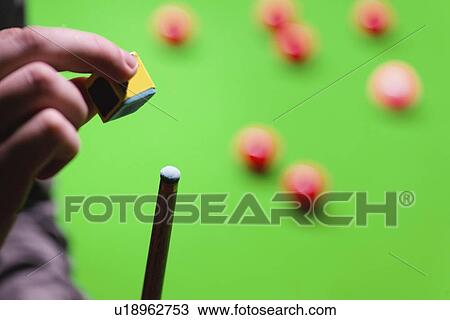 Chalking pool cue View Large Photo Image Stock Image - Chalking pool cue. Fotosearch