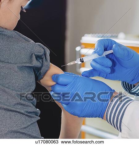 Stock Image - Child vaccination. Fotosearch