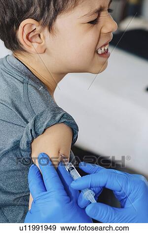Stock Photo - Child vaccination. Fotosearch