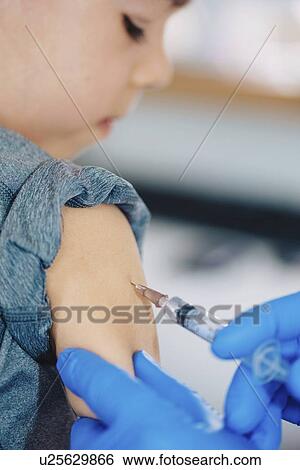 Stock Photograph - Child vaccination. Fotosearch