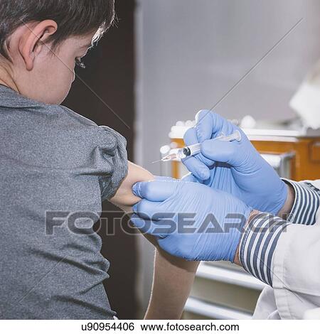 Stock Photograph - Child vaccination. Fotosearch