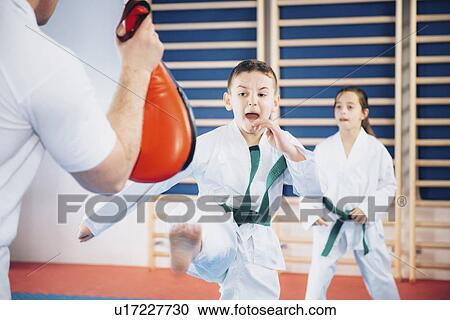 Children in taekwondo class View Large Photo Image Stock Image - Children in taekwondo class. Fotosearch