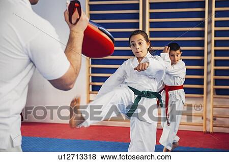 Children in taekwondo class View Large Photo Image Stock Photo - Children in taekwondo class. Fotosearch